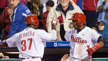 May 14, 2016; Philadelphia, PA, USA; Philadelphia Phillies center fielder Odubel Herrera (37) celebrates with third baseman Maikel Franco (7) after hitting a solo home run during the seventh inning against the Cincinnati Reds at Citizens Bank Park. The Philadelphia Phillies won 4-3. Mandatory Credit: Bill Streicher-USA TODAY Sports