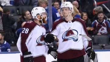 TORONTO, ON - JANUARY 14: Colorado Avalanche Center Carl Soderberg (34) celebrates after scoring a hat trick into the empty net with Colorado Avalanche Defenceman Ian Cole (28) during the third period of the NHL regular season game between the Colorado Avalanche and the Toronto Maple Leafs on January 14, 2019, at Scotiabank Arena in Toronto, ON, Canada. (Photo by Julian Avram/Icon Sportswire via Getty Images)