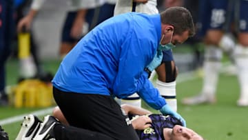 Newcastle United's Matt Ritchie receives medical treatment. (Photo by DANIEL LEAL-OLIVAS/POOL/AFP via Getty Images)