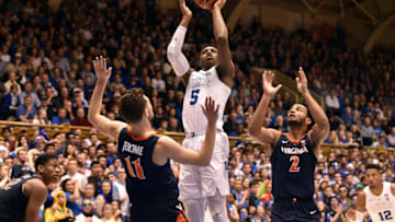 DURHAM, NORTH CAROLINA - JANUARY 19: RJ Barrett #5 of the Duke Blue Devils shoots over Ty Jerome #11 of the Virginia Cavaliers during the second half of their game at Cameron Indoor Stadium on January 19, 2019 in Durham, North Carolina. Duke won 72-70. (Photo by Grant Halverson/Getty Images)