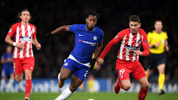 LONDON, ENGLAND - DECEMBER 05: Michy Batshuayi of Chelsea is challenged by Lucas Hernandez of Atletico Madrid during the UEFA Champions League group C match between Chelsea FC and Atletico Madrid at Stamford Bridge on December 5, 2017 in London, United Kingdom. (Photo by Shaun Botterill/Getty Images)