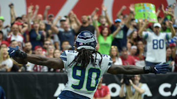 GLENDALE, ARIZONA - SEPTEMBER 29: Outside linebacker Jadeveon Clowney #90 of the Seattle Seahawks celebrates a touchdown in the first half of the NFL game against the Arizona Cardinals at State Farm Stadium on September 29, 2019 in Glendale, Arizona. The Seahawks won 27 to 10. (Photo by Jennifer Stewart/Getty Images)