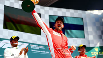 NORTHAMPTON, ENGLAND - JULY 08: Race winner Sebastian Vettel of Germany and Ferrari (Photo by Dan Istitene/Getty Images)
