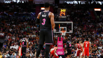 MIAMI, FL - JANUARY 04: Dwyane Wade #3 of the Miami Heat reacts against the Washington Wizards at American Airlines Arena on January 4, 2019 in Miami, Florida. NOTE TO USER: User expressly acknowledges and agrees that, by downloading and or using this photograph, User is consenting to the terms and conditions of the Getty Images License Agreement. (Photo by Michael Reaves/Getty Images)