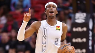 Shai Gilgeous-Alexander #2 of the Oklahoma City Thunder dribbles against the Miami Heat during the first half at FTX Arena on March 18, 2022 in Miami, Florida. NOTE TO USER: User expressly acknowledges and agrees that, by downloading and or using this photograph, User is consenting to the terms and conditions of the Getty Images License Agreement. (Photo by Michael Reaves/Getty Images)