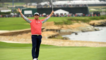 PEBBLE BEACH, CALIFORNIA - JUNE 16: Gary Woodland of the United States celebrates on the 18th green after winning the 2019 U.S. Open at Pebble Beach Golf Links on June 16, 2019 in Pebble Beach, California. (Photo by Ross Kinnaird/Getty Images)