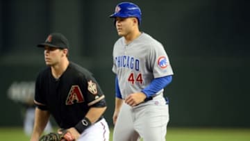 Jul 19, 2014; Phoenix, AZ, USA; Chicago Cubs first baseman Anthony Rizzo (44) leads off of first base as Arizona Diamondbacks first baseman Paul Goldschmidt (44) covers at Chase Field. Mandatory Credit: Joe Camporeale-USA TODAY Sports