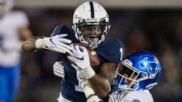 STATE COLLEGE, PA - SEPTEMBER 07: KJ Hamler #1 of the Penn State Nittany Lions catches a pass against Tyrone Hill #33 of the Buffalo Bulls during the second half at Beaver Stadium on September 07, 2019 in State College, Pennsylvania. (Photo by Scott Taetsch/Getty Images)