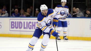 Nov 27, 2023; New York, New York, USA; Buffalo Sabres right wing Kyle Okposo (21) skates with the puck against the New York Rangers during the first period at Madison Square Garden. Mandatory Credit: Danny Wild-USA TODAY Sports