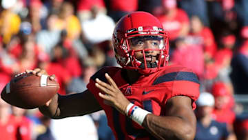 TUCSON, AZ - NOVEMBER 24: Quarterback Khalil Tate #14 of the Arizona Wildcats throws a pass against the Arizona State Sun Devils during the first half of the college football game at Arizona Stadium on November 24, 2018 in Tucson, Arizona. (Photo by Ralph Freso/Getty Images)