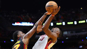 Bam Adebayo #13 of the Miami Heat is fouled by Onyeka Okongwu #17 of the Atlanta Hawks(Photo by Michael Reaves/Getty Images)