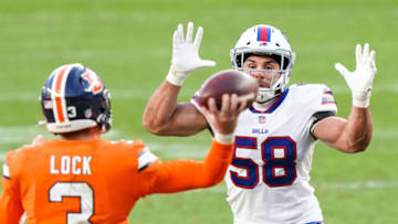 Dec 19, 2020; Denver, Colorado, USA; Buffalo Bills linebacker Matt Milano (58) defends against Denver Broncos quarterback Drew Lock (3) during the second quarter at Empower Field at Mile High. Mandatory Credit: Troy Babbitt-USA TODAY Sports