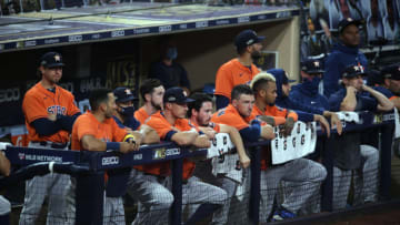 Oct 17, 2020; San Diego, California, USA; Houston Astros bench reacts against the Tampa Bay Rays during the ninth inning in game seven of the 2020 ALCS at Petco Park. Mandatory Credit: Orlando Ramirez-USA TODAY Sports