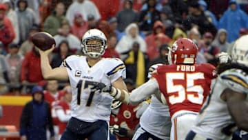 Dec 13, 2015; Kansas City, MO, USA; San Diego Chargers quarterback Philip Rivers (17) throws a pass under pressure from Kansas City Chiefs linebacker Dee Ford (55) in the second half at Arrowhead Stadium. Kansas City won the game 10-3. Mandatory Credit: John Rieger-USA TODAY Sports