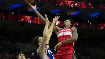 PHILADELPHIA, PA - NOVEMBER 29: Chris McCullough #1 of the Washington Wizards attempts a shot against Ben Simmons #25 of the Philadelphia 76ers in the fourth quarter at the Wells Fargo Center on November 29, 2017 in Philadelphia, Pennsylvania. The 76ers defeated the Wizards 118-113. NOTE TO USER: User expressly acknowledges and agrees that, by downloading and or using this photograph, User is consenting to the terms and conditions of the Getty Images License Agreement. (Photo by Mitchell Leff/Getty Images)