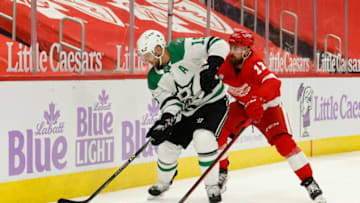 Apr 24, 2021; Detroit, Michigan, USA; Dallas Stars center Joe Pavelski (16) skates with the puck chased by Detroit Red Wings defenseman Filip Hronek (17) in the third period at Little Caesars Arena. Mandatory Credit: Rick Osentoski-USA TODAY Sports