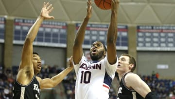 Nov 14, 2014; Storrs, CT, USA; Connecticut Huskies guard Sam Cassell Jr. (10) shoots against Bryant University Bulldogs forward Dan Garvin (22) during the first half at Harry A. Gampel Pavilion. Mandatory Credit: David Butler II-USA TODAY Sports