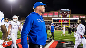 LUBBOCK, TEXAS - NOVEMBER 12: Head coach Lance Leipold of the Kansas Jayhawks walks across the field after the game against the Texas Tech Red Raiders at Jones AT&T Stadium on November 12, 2022 in Lubbock, Texas. (Photo by John E. Moore III/Getty Images)