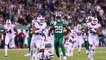 EAST RUTHERFORD, NJ - NOVEMBER 02: Running back Bilal Powell #29 of the New York Jets runs the ball against strong safety Micah Hyde #23 of the Buffalo Bills during the third quarter of the game at MetLife Stadium on November 2, 2017 in East Rutherford, New Jersey. (Photo by Al Bello/Getty Images)