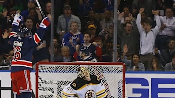 Mar 23, 2016; New York, NY, USA; New York Rangers center Derick Brassard (16) reacts after a goal scored by teammate right wing Mats Zuccarello (36) (not pictured) against Boston Bruins goalie Tuukka Rask (40) during first period at Madison Square Garden. Mandatory Credit: Noah K. Murray-USA TODAY Sports