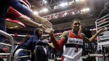 Nov 19, 2013; Washington, DC, USA; Washington Wizards shooting guard Bradley Beal (3) shakes hands with fans after the Wizards