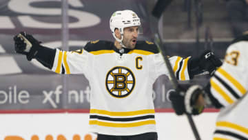 Apr 10, 2021; Philadelphia, Pennsylvania, USA; Boston Bruins center Patrice Bergeron (37) reacts after scoring a goal against the Philadelphia Flyers in the first period at the Wells Fargo Center. Mandatory Credit: Mitchell Leff-USA TODAY Sports