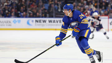 Feb 28, 2023; Buffalo, New York, USA; Buffalo Sabres center Dylan Cozens (24) looks to make a pass during the second period against the Columbus Blue Jackets at KeyBank Center. Mandatory Credit: Timothy T. Ludwig-USA TODAY Sports