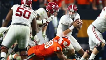 Jan 11, 2016; Glendale, AZ, USA; Clemson Tigers defensive end Kevin Dodd (98) sacks Alabama Crimson Tide quarterback Jake Coker(14) in the 2016 CFP National Championship at University of Phoenix Stadium. Mandatory Credit: Mark J. Rebilas-USA TODAY Sports