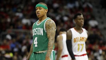 Apr 26, 2016; Atlanta, GA, USA; Boston Celtics guard Isaiah Thomas (4) walks past Atlanta Hawks guard Dennis Schroder (17) in the third quarter in game five of the first round of the NBA Playoffs at Philips Arena. Mandatory Credit: Brett Davis-USA TODAY Sports