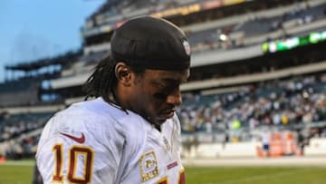 Nov 17, 2013; Philadelphia, PA, USA; Washington Redskins quarterback Robert Griffin III (10) walks off the field after the game against the Philadelphia Eagles at Lincoln Financial Field. The Philadelphia Eagles won the game 24-16. Mandatory Credit: John Geliebter-USA TODAY Sports