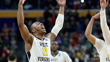 BUFFALO, NY - MARCH 18: Jevon Carter #2 of the West Virginia Mountaineers celebrates after defeating the Notre Dame Fighting Irish 83-71 during the second round of the 2017 NCAA Men's Basketball Tournament at KeyBank Center on March 18, 2017 in Buffalo, New York. (Photo by Maddie Meyer/Getty Images)