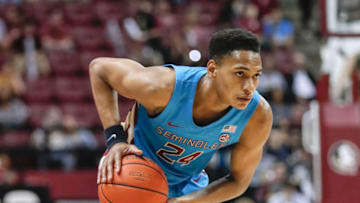 Florida State Seminoles guard Devin Vassell (#24) looks to make a play. (Photo by Don Juan Moore/Getty Images)
