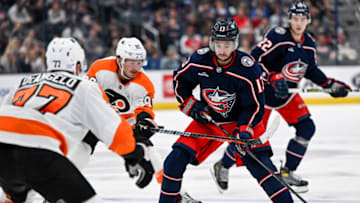 Nov 10, 2022; Columbus, Ohio, USA; Columbus Blue Jackets left wing Johnny Gaudreau (13) skates with the puck past Philadelphia Flyers left wing Joel Farabee (86) in the second period at Nationwide Arena. Mandatory Credit: Gaelen Morse-USA TODAY Sports