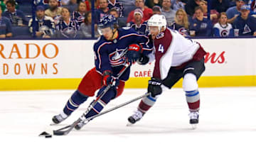 COLUMBUS, OH - OCTOBER 9: Tyson Barrie #4 of the Colorado Avalanche attempts to steal the puck from Artemi Panarin #9 of the Columbus Blue Jackets during the second period on October 9, 2018 at Nationwide Arena in Columbus, Ohio. (Photo by Kirk Irwin/Getty Images)