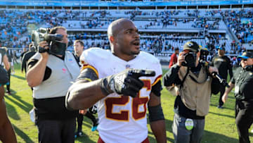 JACKSONVILLE, FL - DECEMBER 16: Adrian Peterson #26 of the Washington Redskins celebrates following the Redskins 16-13 win over the Jacksonville Jaguars at TIAA Bank Field on December 16, 2018 in Jacksonville, Florida. (Photo by Sam Greenwood/Getty Images)