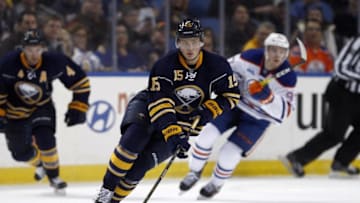 Mar 1, 2016; Buffalo, NY, USA; Buffalo Sabres center Jack Eichel (15) carries the puck up the ice during the third period against the Edmonton Oilers at First Niagara Center. Edmonton beats Buffalo 2 to 1 in overtime. Mandatory Credit: Timothy T. Ludwig-USA TODAY Sports