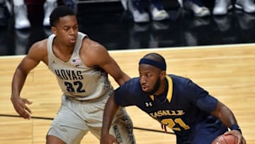 Dec 10, 2016; Miami, FL, USA; Georgetown Hoyas guard Kaleb Johnson (32) defends against La Salle Explorers guard Jordan Price (21) during the first half at American Airlines Arena. Mandatory Credit: Steve Mitchell-USA TODAY Sports