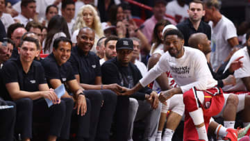 Udonis Haslem #40 of the Miami Heat laughs with head coach Erik Spoelstra against the Philadelphia 76ers(Photo by Michael Reaves/Getty Images)