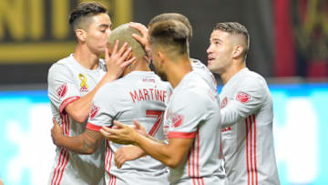 ATLANTA, GA SEPTEMBER 13: Atlanta's Miguel Almiron (left) kisses Josef Martinez (7) after Martinez scored on a penalty kick during a match between Atlanta United and the New England Revolution on September 13, 2017 at Mercedes-Benz Stadium in Atlanta, GA. Atlanta United FC beat the New England Revolution by a score of 6 - 0. (Photo by Rich von Biberstein/Icon Sportswire via Getty Images)