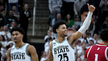 Feb 21, 2023; East Lansing, Michigan, USA; Michigan State Spartans forward Malik Hall (25) and guard Jaden Akins (3) celebrate a play against the Indiana Hoosiers defense second half at Jack Breslin Student Events Center. Mandatory Credit: Dale Young-USA TODAY Sports