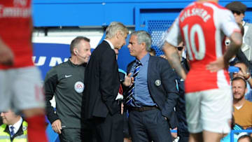 LONDON, ENGLAND - OCTOBER 05: Arsene Wenger the Arsenal Manager clashes chats with Jose Mourinho the Manager of Chelsea during the Barclays Premier League match between Chelsea and Arsenal at Stamford Bridge on October 5, 2014 in London, England. (Photo by David Price/Arsenal FC via Getty Images)
