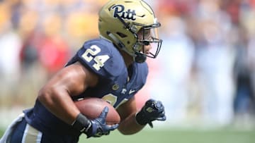 Sep 5, 2015; Pittsburgh, PA, USA; Pittsburgh Panthers running back James Conner (24) carries the ball against the Youngstown State Penguins during the first half at Heinz Field. Mandatory Credit: Charles LeClaire-USA TODAY Sports