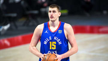 Nikola Jokic #15 of the Denver Nuggets shoots a free throw against the Detroit Pistons (Photo by Nic Antaya/Getty Images)