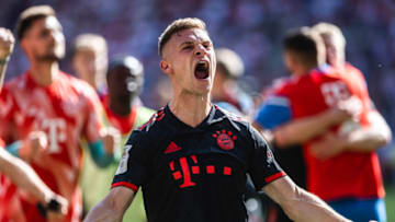 Bayern Munich midfielder Joshua Kimmich dismisses reports linking him to Barcelona. (Photo by Mika Volkmann/Getty Images)