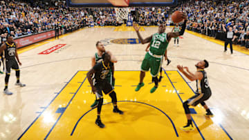 OAKLAND, CA - JANUARY 27: Terry Rozier #12 of the Boston Celtics gets the rebound against the Golden State Warriors on January 27, 2018 at ORACLE Arena in Oakland, California. NOTE TO USER: User expressly acknowledges and agrees that, by downloading and/or using this Photograph, user is consenting to the terms and conditions of the Getty Images License Agreement. Mandatory Copyright Notice: Copyright 2018 NBAE (Photo by Andrew D. Bernstein/NBAE via Getty Images)