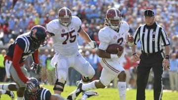 Sep 17, 2016; Oxford, MS, USA; Alabama Crimson Tide quarterback Jalen Hurts (2) runs the ball during the second half of the game against the Mississippi Rebels at Vaught-Hemingway Stadium. Mandatory Credit: Matt Bush-USA TODAY Sports