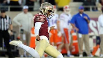Nov 29, 2014; Tallahassee, FL, USA; Florida State Seminoles kicker Roberto Aguayo (19) kicks the ball during the game against the Florida Gators at Doak Campbell Stadium. Mandatory Credit: Melina Vastola-USA TODAY Sports