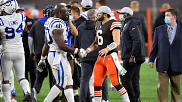 CLEVELAND, OHIO - OCTOBER 11: Justin Houston #50 of the Indianapolis Colts and Baker Mayfield #6 of the Cleveland Browns meet after the Browns beat the Colts 32-23 at FirstEnergy Stadium on October 11, 2020 in Cleveland, Ohio. (Photo by Jason Miller/Getty Images)