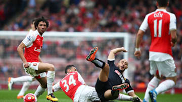 LONDON, ENGLAND - APRIL 02: Nordin Amrabat of Watford is tackled by Francis Coquelin of Arsenal during the Barclays Premier League match between Arsenal and Watford at Emirates Stadium on April 2, 2016 in London, England. (Photo by Ian Walton/Getty Images)