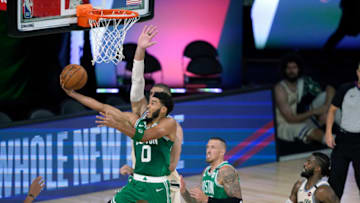 Former Duke basketball star Jayson Tatum attempts a layup with he Boston Celtics. (Photo by Ashley Landis-Pool/Getty Images)